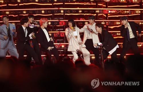 This photo distributed by Reuters shows BTS and Halsey staging a joint performance of "Boy With Luv" during the 2019 Billboard Music Awards on May 1, 2019. (Yonhap)