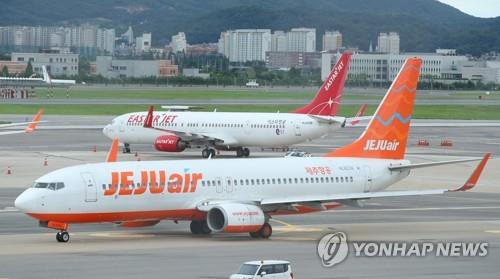 This file photo shows Jeju Air Co. planes. (Yonhap) 