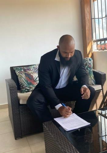 Zoilo Almonte signs his contract with the KT Wiz of the Korea Baseball Organization, in this photo provided by the Wiz on Dec. 23, 2020. (PHOTO NOT FOR SALE) (Yonhap)