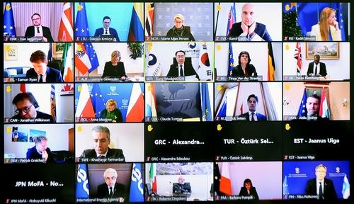 This photo, provided by South Korea's industry ministry on March 2, 2022, shows the ministerial-level Extraordinary Governing Board meeting of the International Energy Agency (IEA), which was attended by 31 nations the previous day. During the meeting, the countries agreed to release 60 million barrels of oil from their emergency reserves amid the Ukraine crisis. (PHOTO NOT FOR SALE) (Yonhap)