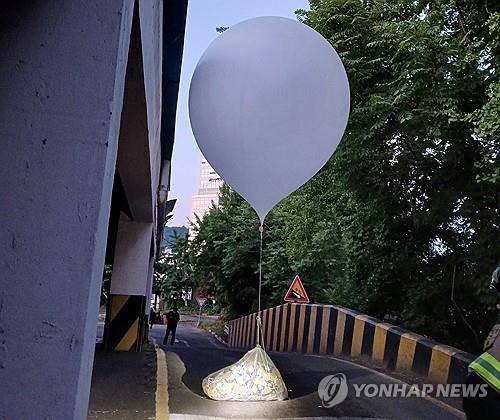 This photo, provided by the Incheon Fire Service, shows a North Korean balloon carrying trash found in Incheon, 27 kilometers west of Seoul, on June 2, 2024. (PHOTO NOT FOR SALE) (Yonhap)
