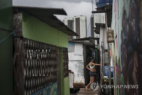 극심한 빈부격차가 갈라놓은 브라질 소두증 공포의 두얼굴 - 5
