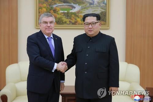 2018년 바흐 IOC 위원장 접견하는 김정은 북한 국무위원장 