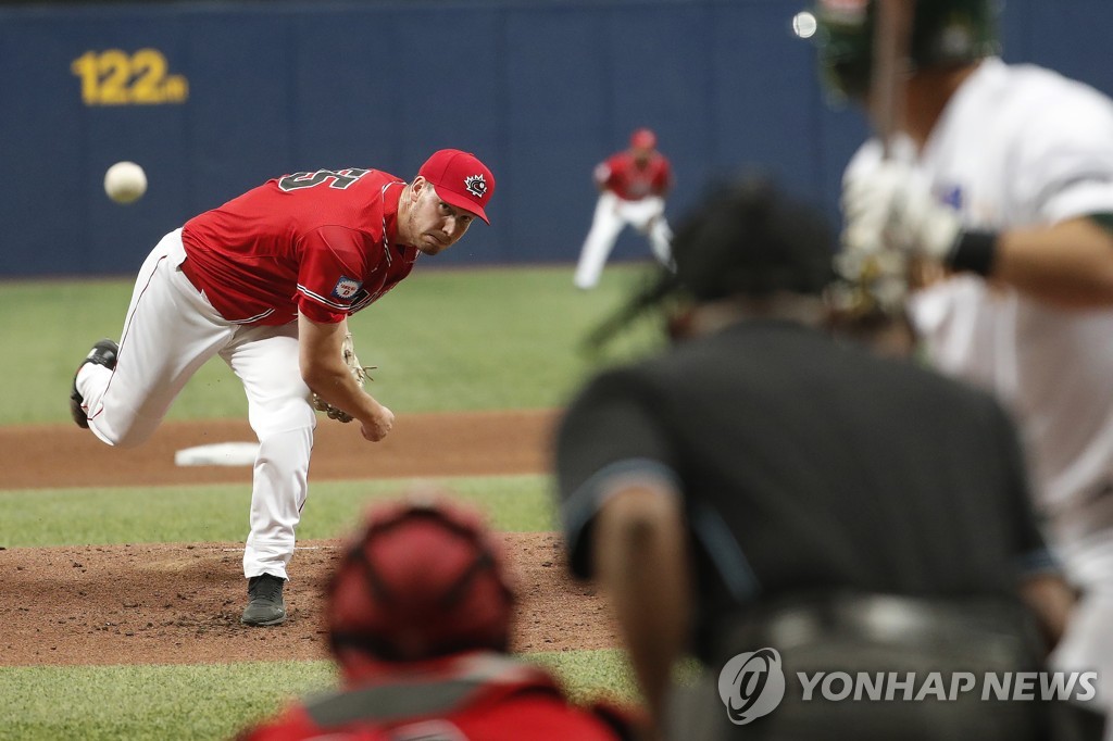 In this Associated Press photo, Brock Dykxhoorn of Canada throws in the bottom of the first inning of a Group C game against Australia at the Premier12 at Gocheok Sky Dome in Seoul on Nov. 8, 2019. (Yonhap)