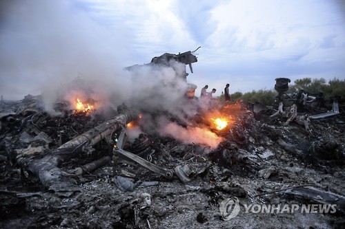 FILE UKRAINE MALAYSIA MH17 CRASH INVESTIGATION