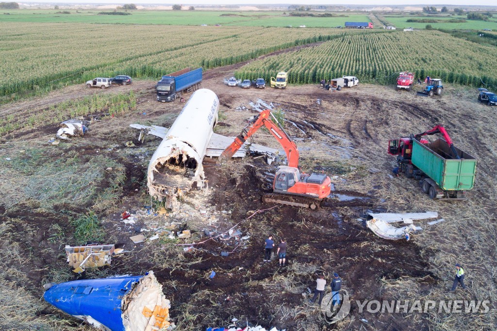 Dismantling Airbus A321 jet at crash landing site near Zhukovsky Airport