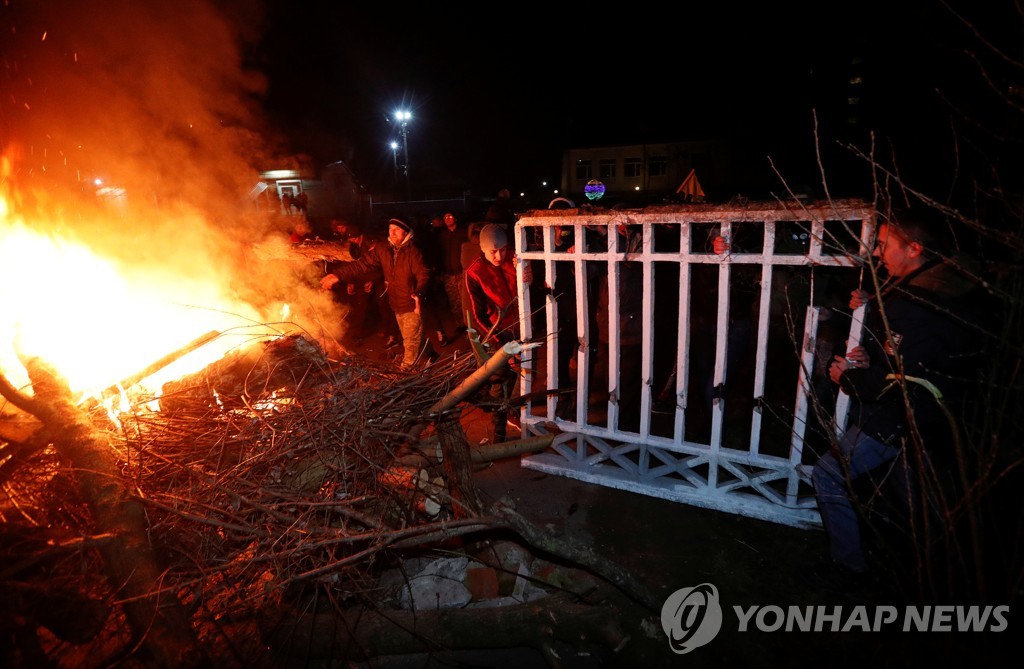 CHINA-HEALTH/UKRAINE-PROTESTS