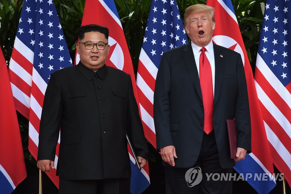 북미 공동성명에 합의한 김정은 국방위원장과 트럼프 대통령