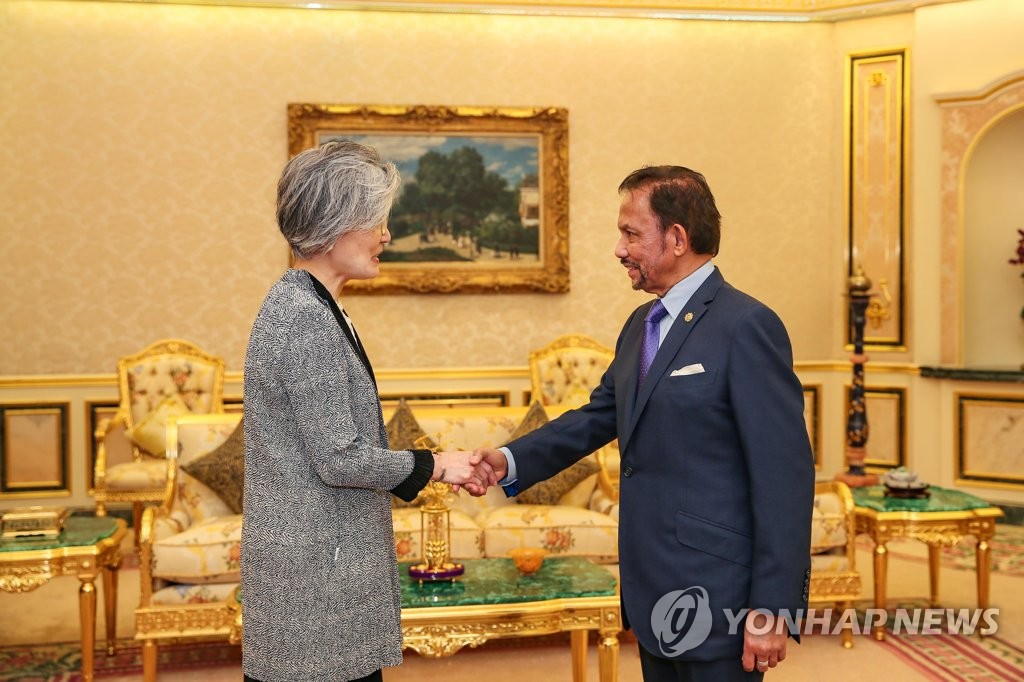 Avec le sultan du Brunei Avec le sultan du Brunei