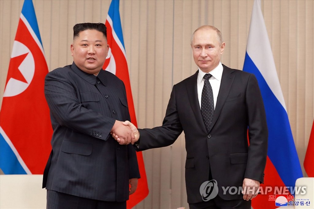 김정은 북한 국무위원장(왼쪽)과 블라디미르 푸틴 러시아 대통령