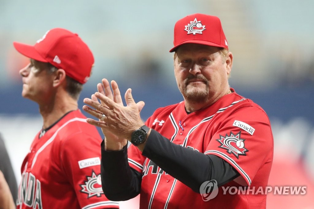 Ernie Whitt, manager of Canada, claps before the start of his team's Group C game against South Korea at the Premier12 at Gocheok Sky Dome in Seoul on Nov. 7, 2019. (Yonhap)