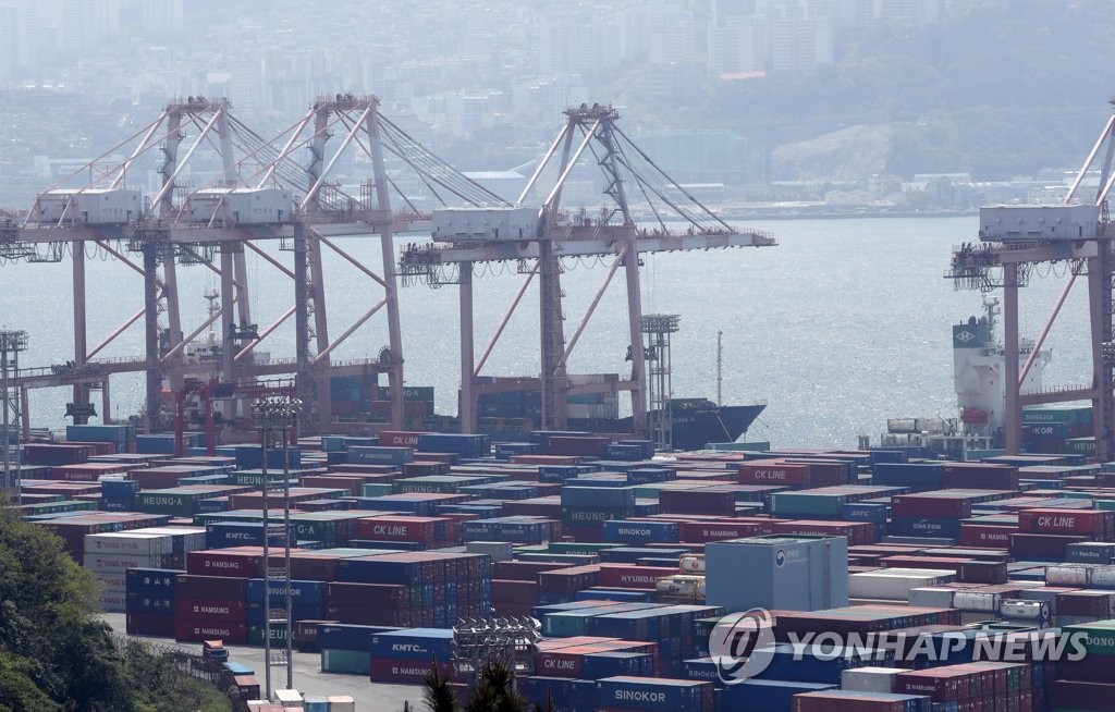 The file photo, taken May 1, 2020, shows stacks of import-export cargo at South Korea's largest seaport in Busan, 450 kilometers south of Seoul. (Yonhap)