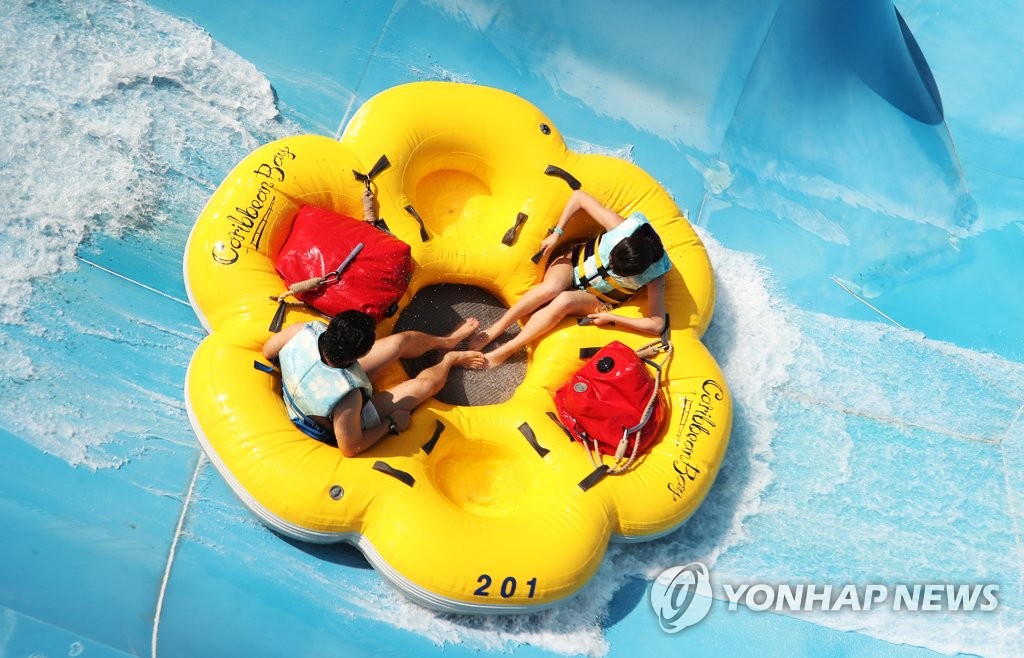 Social distancing at water park Social distancing at water park