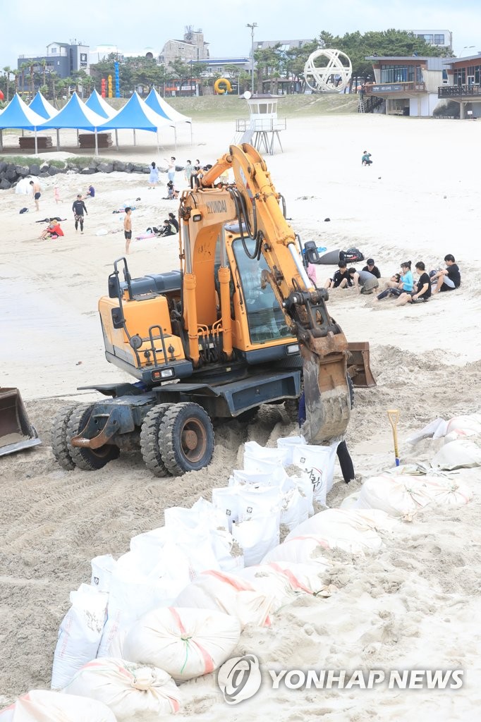 Prep for beach opening Prep for beach opening