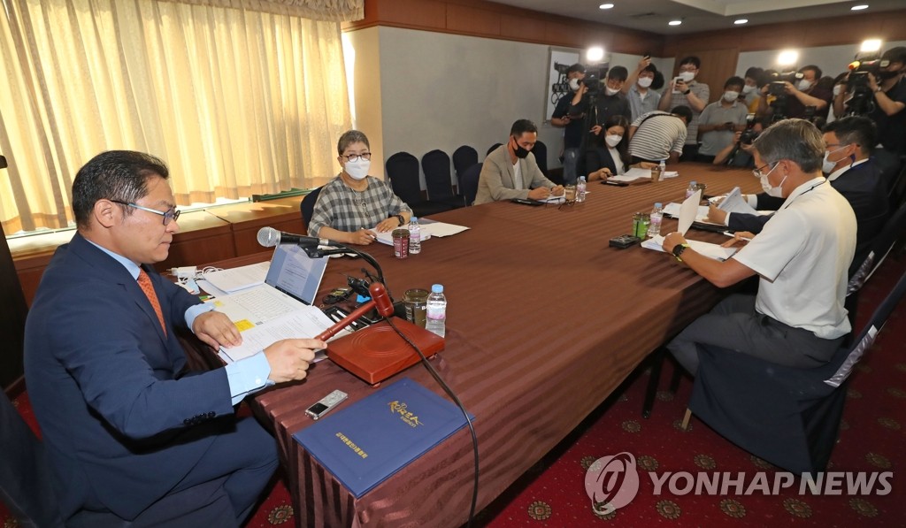 Members of the disciplinary committee for the Korea Triathlon Federation meet in Seoul on July 6, 2020, over an abuse scandal centered on the Gyeongju City Hall triathlon team coach and athletes. (Yonhap) 