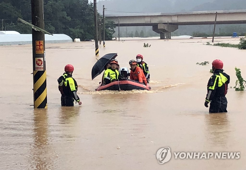 Resident rescued from flooded village Resident rescued from flooded village