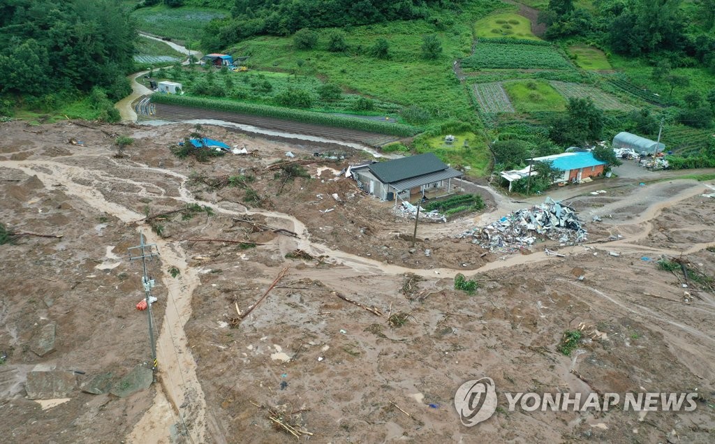 Village hit by landslide Village hit by landslide