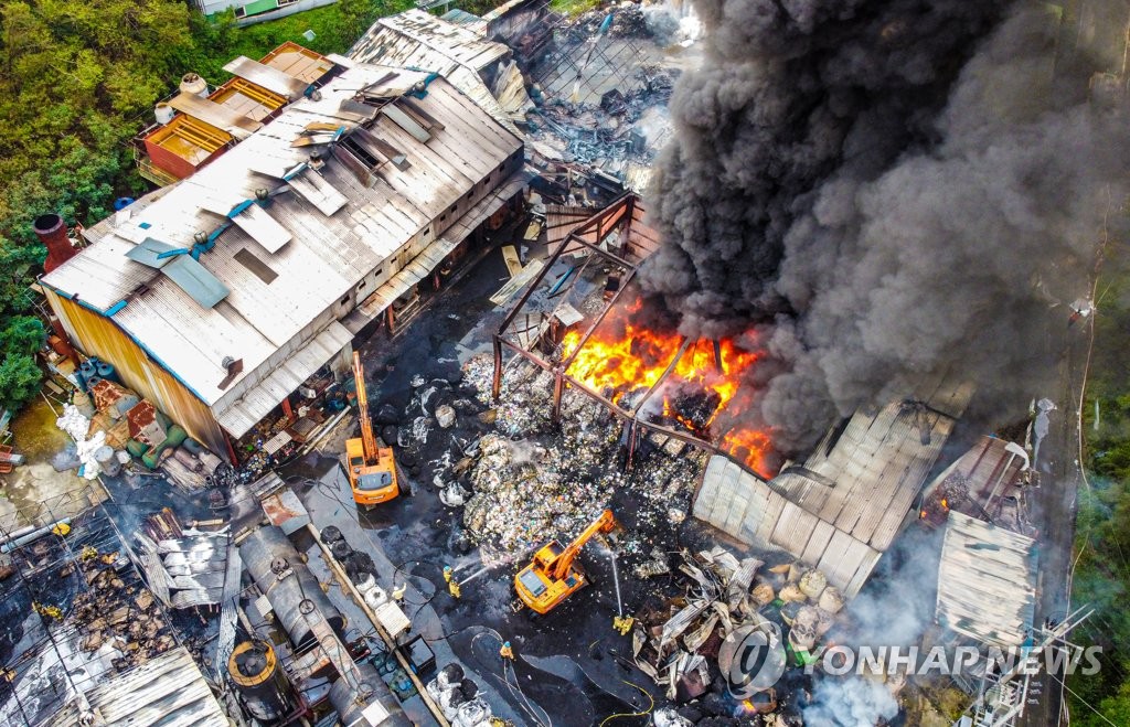 Fire at waste recycling facility Fire at waste recycling facility