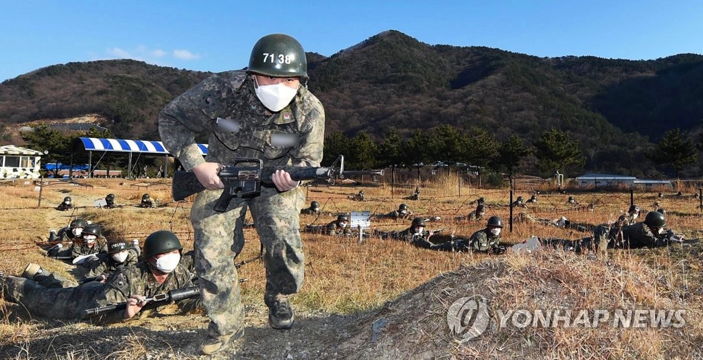 Masked soldiers during training Masked soldiers during training