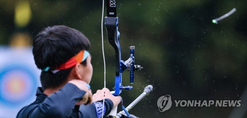 우승 화살 날리는 김제덕