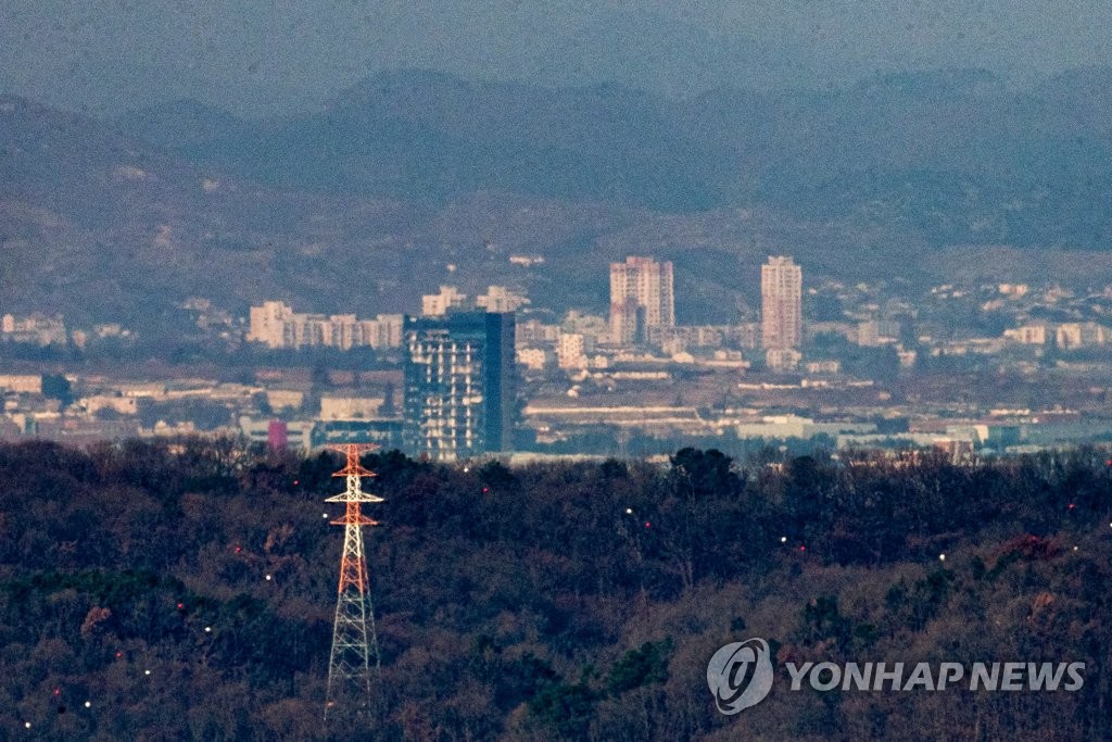 This photo, taken from the South Korean border city of Paju on Nov. 24, 2021, shows North Korea's Kaesong city across the border. (Yonhap)