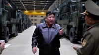 김정은, ICBM 화성-18형 발사차량 공장 방문…"핵무력 급속 강화"