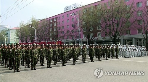 (LEAD) N.K. stages massive military parade on founder's birthday