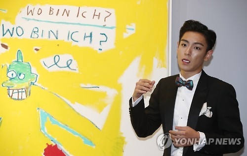 In this file photo taken on Sept. 19, 2016, T.O.P., a member of South Korean boy band BIGBANG, attends a news conference on a planned special Sotheby auction at Hotel Shilla in Seoul. (Yonhap) 
