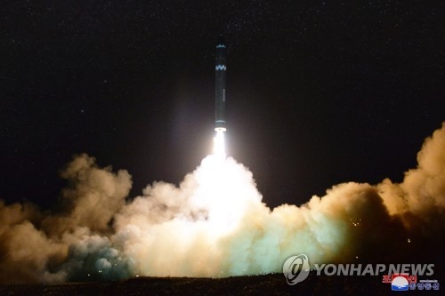 This photo, released by North Korea's media on Nov. 30, 2017, shows the North's firing of a new intercontinental ballistic missile a day earlier. (For Use Only in the Republic of Korea. No Redistribution) (Yonhap)