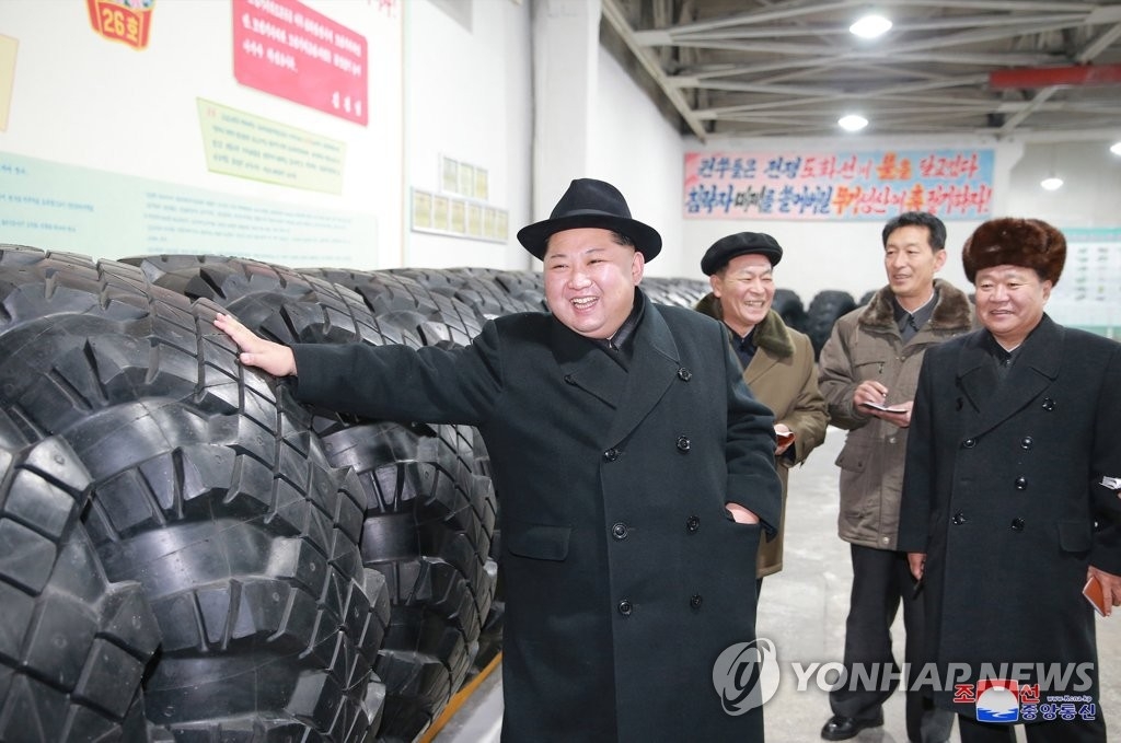 North Korean leader Kim Jong-un inspects the Amnokgang Tire Factory in this photo released by the North's media on Dec. 3, 2017. (For Use Only in the Republic of Korea. No Redistribution) (Yonhap)