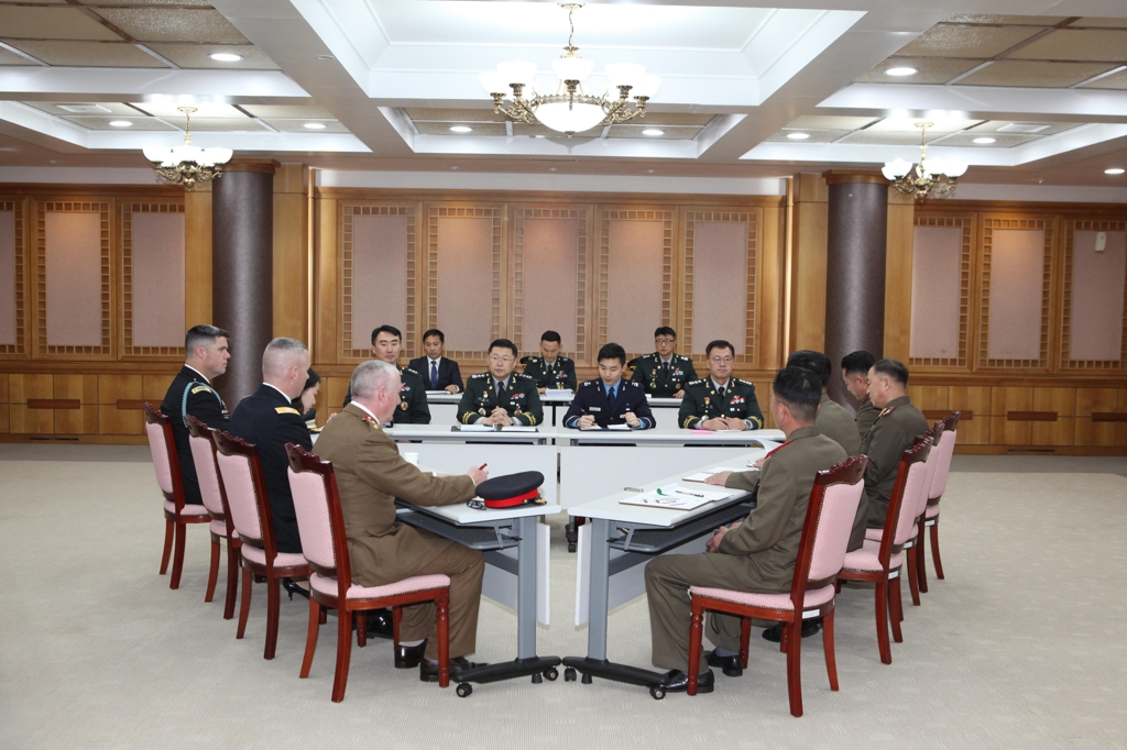 Military officials from the two Koreas and the U.N. Command hold talks over disarming the Joint Security Area in the Demilitarized Zone at the truce village of Panmunjom on Oct. 22, 2018, in this photo provided by Seoul's defense ministry. (Yonhap)