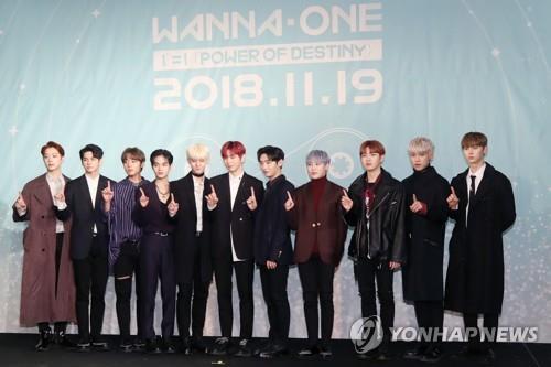 K-pop boy group Wanna One poses for photos during a press conference for its new album "1¹¹=1 (Power of Destiny)" in Seoul on Nov. 19, 2018. (Yonhap)