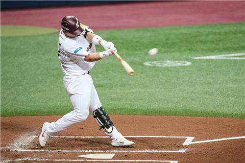 Park Dong-won of the Kiwoom Heroes hits a solo home run against the Samsung Lions in the bottom of the second inning of a Korea Baseball Organization regular season game at Gocheok Sky Dome in Seoul on May 12, 2020, in this photo provided by the Heroes. (PHOTO NOT FOR SALE) (Yonhap)