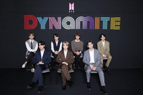 This photo, provided by Big Hit Entertainment, shows the members of BTS posing for photos during an online media day event in Seoul on Sept. 2, 2020. (PHOTO NOT FOR SALE) (Yonhap)