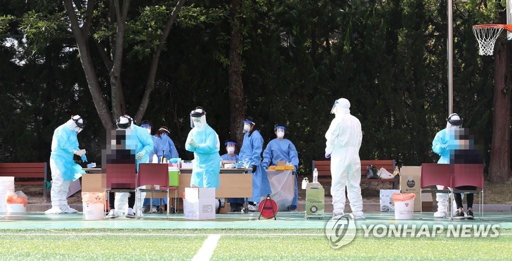 The undated file photo shows a makeshift coronavirus test center in South Korea. (Yonhap)