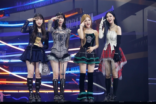 This photo of aespa during the 2021 Mnet Asian Music Awards is provided by CJ ENM. (PHOTO NOT FOR SALE) (Yonhap)