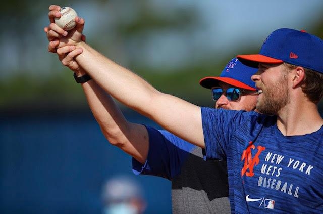 Ricky Meinhold (L), coaching for the New York Mets, works with pitcher Tommy Wilson, in this undated photo provided by Meinhold. (PHOTO NOT FOR SALE) (Yonhap)