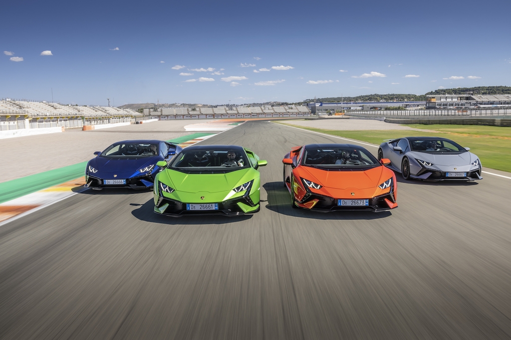 This undated file photo provided by Automobili Lamborghini shows its Huracan models driving on a racetrack. (PHOTO NOT FOR SALE) (Yonhap)