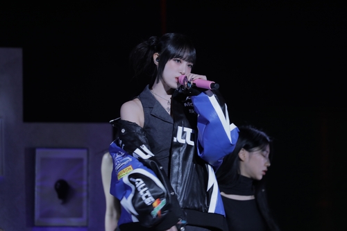 Choi Yena performs during a media showcase in Seoul on Jan. 16, 2023, for her first single "Love War" in this photo provided by her agency, Yue Hua Entertainment. (PHOTO NOT FOR SALE) (Yonhap)