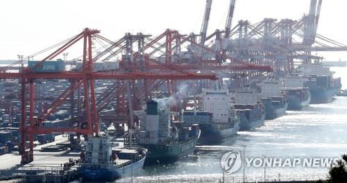 This photo taken Jan. 10, 2023, shows stacks of containers at a port in South Korea's southeastern city of Busan. (Yonhap)