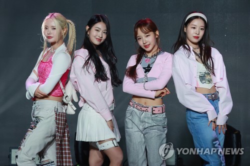 K-pop girl group Fifty Fifty poses for the camera during a press conference in Seoul, in this file photo taken April 13, 2023. (Yonhap)