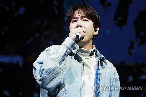 Super Junior member Kyuhyun performs during a media showcase for his new EP, "Restart," in Seoul on Jan. 9, 2024. (Yonhap)