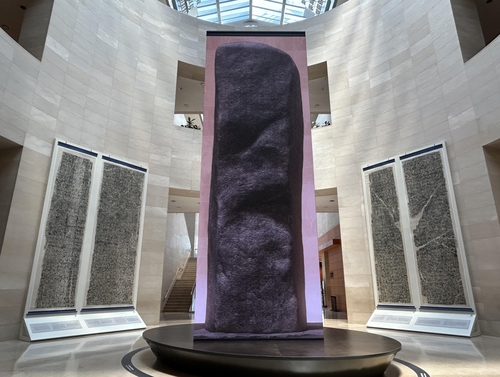 This photo shows a digital reproduction of the Gwanggwato the Great Stele, a memorial stele for the tomb of Gwanggaeto the Great of Goguryeo, on display at the National Museum of Korea in central Seoul on Jan. 24, 2024. (Yonhap)