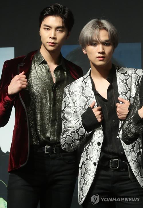 K-pop boy group NCT's Johnny (L) and Haechan (Yonhap)