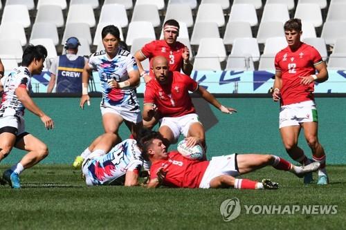 A equipe de rugby de 7 jogadores da Coreia e do País de Gales jogou sua primeira partida no nono dia