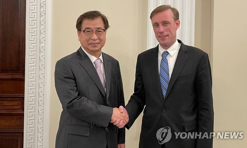 Suh Hoon (L), director of national security at South Korea's presidential office, poses for a photo with U.S. National Security Advisor Jake Sullivan during their meeting in Washington on Oct. 12, 2021, in this photo released by the South Korean Embassy in the U.S. capital. (PHOTO NOT FOR SALE) (Yonhap)