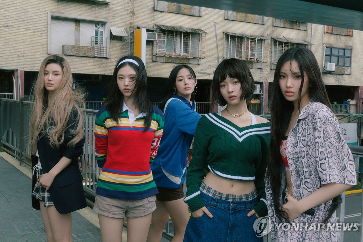 K-pop girl group NewJeans is seen in this photo provided by ADOR. (PHOTO NOT FOR SALE) (Yonhap)