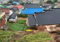 토사 밀려든 주택