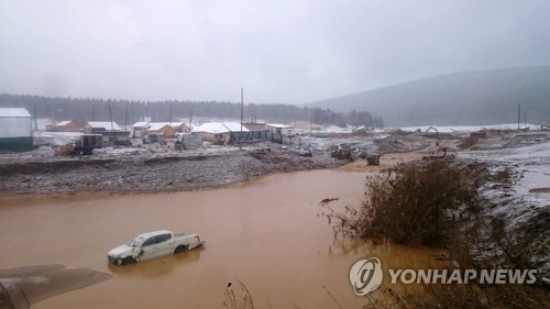 (AFP=연합뉴스) 러시아 크라스노야르스크 댐 붕괴사고 현장. 