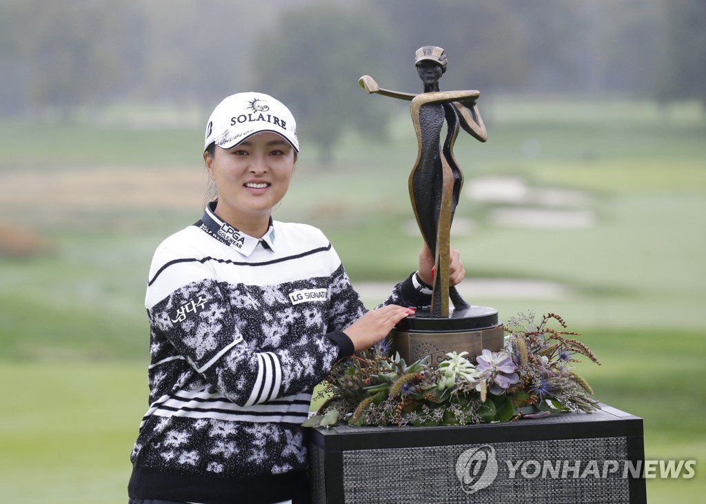 In this UPI file photo from Oct. 10, 2021, Ko Jin-young of South Korea poses with the champion's trophy after winning the Cognizant Founders Cup at Mountain Ridge Country Club in West Caldwell, New Jersey. (Yonhap)